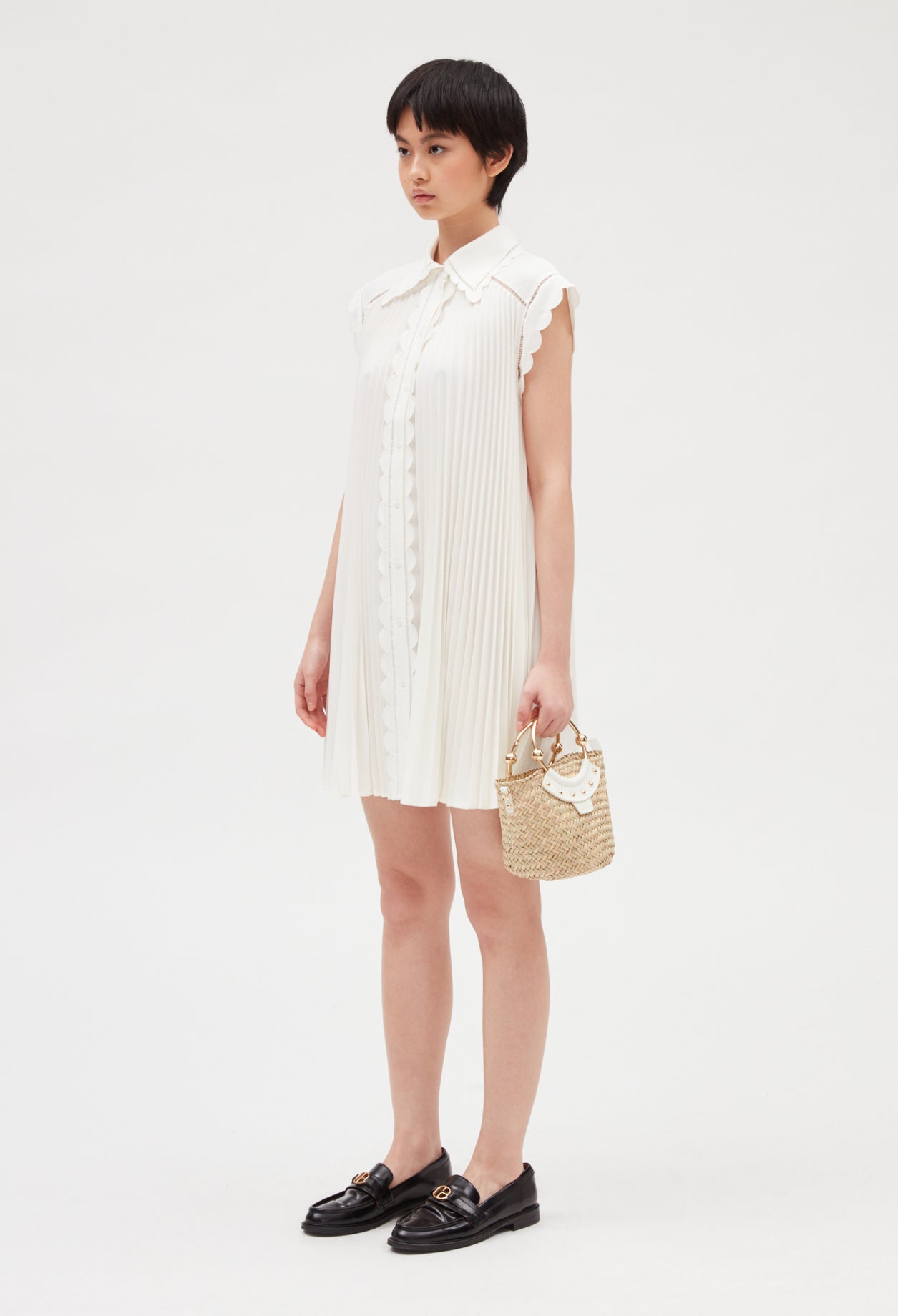 Vestido corto plisado